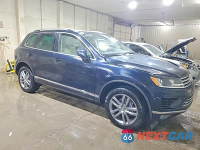 Czwarte zdjęcie samochodu z boku: 2015 VOLKSWAGEN TOUAREG V6 VIN:WVGEF9BP4FD002222 - miniatura