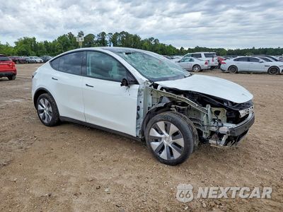 Czwarte zdjęcie samochodu z boku: 2023 TESLA MODEL Y VIN:7SAYGDEE3PA149167 - miniatura