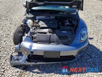 Zdjęcie 11 z 13 samochodu: 2014 VOLKSWAGEN BEETLE VIN:3VW517AT3EM815248 - miniatura