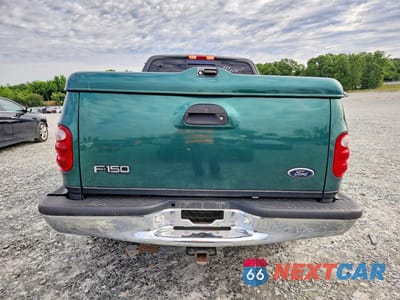 Zdjęcie 6 z 12 samochodu: 2000 FORD F150 VIN:2FTRX07L5YCA56524 - miniatura