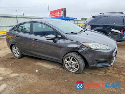 Czwarte zdjęcie samochodu z boku: 2015 FORD FIESTA SE VIN:3FADP4BJ4FM133334 - miniatura