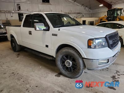 Czwarte zdjęcie samochodu z boku: 2004 FORD F150 VIN:1FTPX12534NB67521 - miniatura
