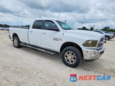 Czwarte zdjęcie samochodu z boku: 2014 RAM 3500 SLT VIN:3C63R3HL7EG109570 - miniatura