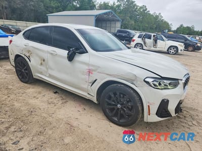 Czwarte zdjęcie samochodu z boku: 2022 BMW X4 XDRIVE30I VIN:5UX33DT00N9K27116 - miniatura