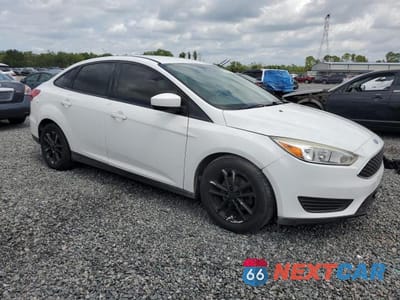 Czwarte zdjęcie samochodu z boku: 2018 FORD FOCUS VIN:1FADP3F20JL250402 - miniatura