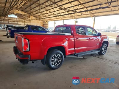 Trzecie zdjęcie samochodu z tyłu: 2015 GMC CANYON SLE VIN:1GTG6BE30F1227915 - miniatura