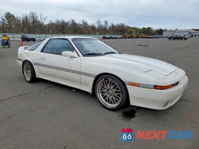 Czwarte zdjęcie samochodu z boku: 1991 TOYOTA SUPRA TURBO VIN:JT2MA71N3M0156341 - miniatura