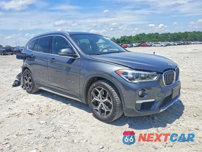 Czwarte zdjęcie samochodu z boku: 2016 BMW X1 XDRIVE28I VIN:WBXHT3C3XG5E48539 - miniatura