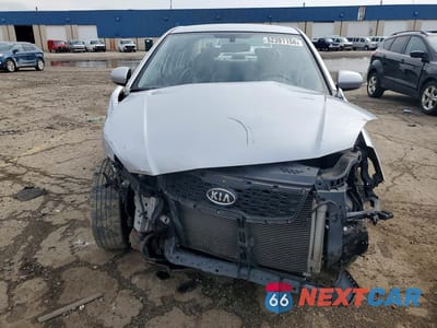 Piąte zdjęcie samochodu w środku: 2011 KIA RIO LX VIN:KNADH4A32B6738177 - miniatura