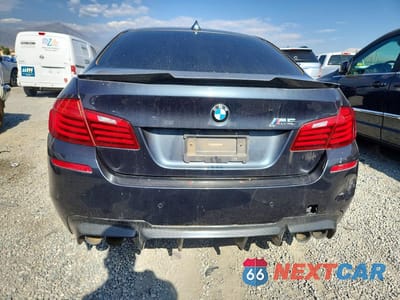 Zdjęcie 6 z 12 samochodu: 2016 BMW M5 VIN:WBSFV9C53GG343211 - miniatura