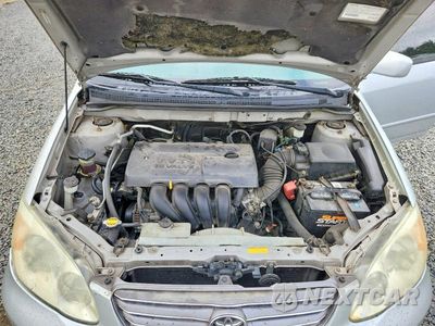 Zdjęcie 11 z 12 samochodu: 2003 TOYOTA COROLLA LE VIN:JTDBR32E930033155 - miniatura