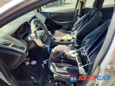 Zdjęcie 7 z 12 samochodu: 2016 FORD FOCUS VIN:1FADP3E2XGL221399 - miniatura