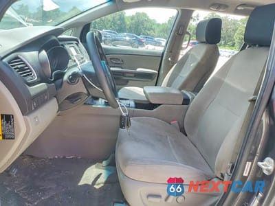 Zdjęcie 7 z 13 samochodu: 2015 KIA SEDONA LX VIN:KNDMB5C15F6020702 - miniatura