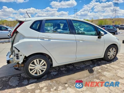 Trzecie zdjęcie samochodu z tyłu: 2015 HONDA FIT LX VIN:3HGGK5G57FM768587 - miniatura