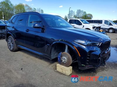Czwarte zdjęcie samochodu z boku: 2026 BMW X5 XDRIVE50E VIN:5UX43EU06T9296611 - miniatura