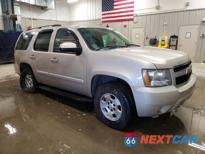 Czwarte zdjęcie samochodu z boku: 2007 CHEVROLET TAHOE K1500 VIN:1GNFK130X7R184317 - miniatura