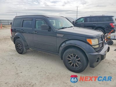 Czwarte zdjęcie samochodu z boku: 2010 DODGE NITRO SXT VIN:1D4PU5GK6AW108860 - miniatura