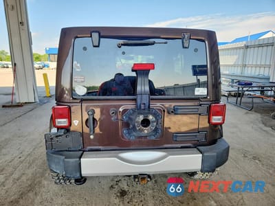 Zdjęcie 6 z 13 samochodu: 2013 JEEP WRANGLER UNLIMITED SAHARA VIN:1C4BJWEGXDL687930 - miniatura