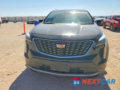 Piąte zdjęcie samochodu w środku: 2022 CADILLAC XT4 PREMIUM LUXURY VIN:1GYFZDR44NF100095 - miniatura