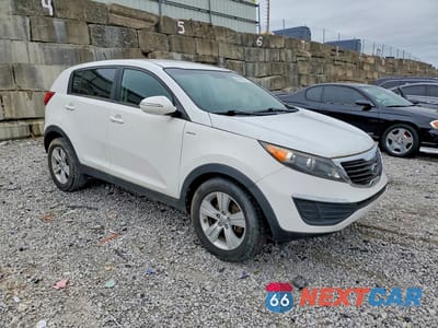 Czwarte zdjęcie samochodu z boku: 2012 KIA SPORTAGE LX VIN:KNDPBCA27C7201416 - miniatura