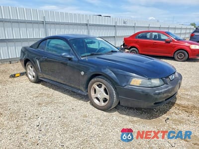 Czwarte zdjęcie samochodu z boku: 2004 FORD MUSTANG VIN:1FAFP40484F102588 - miniatura