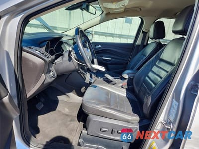 Zdjęcie 7 z 13 samochodu: 2016 FORD ESCAPE TITANIUM VIN:1FMCU0J97GUC11838 - miniatura