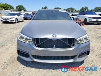 Piąte zdjęcie samochodu w środku: 2019 BMW 530E VIN:WBAJA9C58KB399130 - miniatura