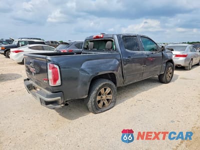 Trzecie zdjęcie samochodu z tyłu: 2016 GMC CANYON SLE VIN:1GTG5CE33G1257713 - miniatura