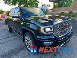 Czwarte zdjęcie samochodu z boku: 2017 GMC SIERRA K1500 DENALI VIN:3GTU2PEJ0HG244163 - miniatura