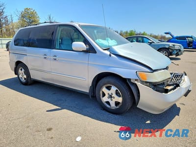 Czwarte zdjęcie samochodu z boku: 2001 HONDA ODYSSEY EX VIN:2HKRL18681H593009 - miniatura