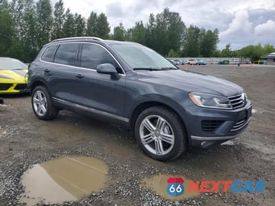 Czwarte zdjęcie samochodu z boku: 2015 VOLKSWAGEN TOUAREG V6 TDI VIN:WVGEP9BP7FD003944 - miniatura
