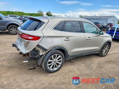 Trzecie zdjęcie samochodu z tyłu: 2015 LINCOLN MKC VIN:5LMCJ2A94FUJ27718 - miniatura