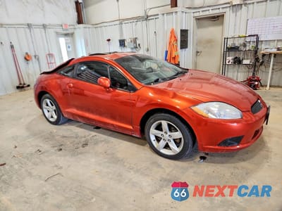 Czwarte zdjęcie samochodu z boku: 2009 MITSUBISHI ECLIPSE GS VIN:4A3AK24F49E031371 - miniatura