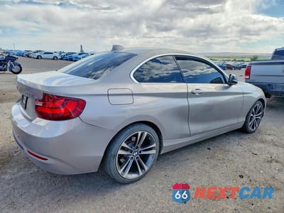 Trzecie zdjęcie samochodu z tyłu: 2015 BMW 228 I VIN:WBA1F5C52FV256818 - miniatura