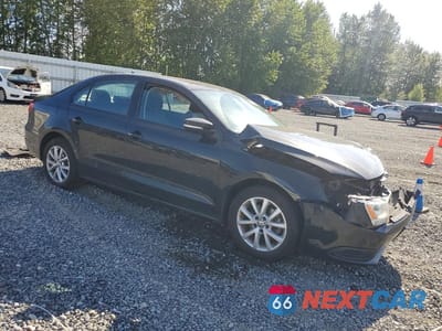 Czwarte zdjęcie samochodu z boku: 2012 VOLKSWAGEN JETTA SE VIN:3VWDP7AJ3CM426762 - miniatura