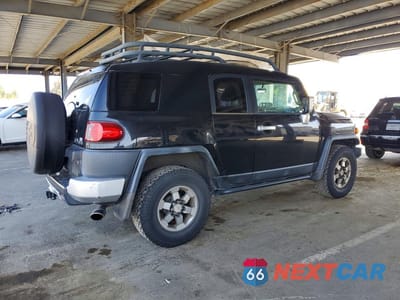 Trzecie zdjęcie samochodu z tyłu: 2007 TOYOTA FJ CRUISER BASE VIN:JTEBU11F970059284 - miniatura