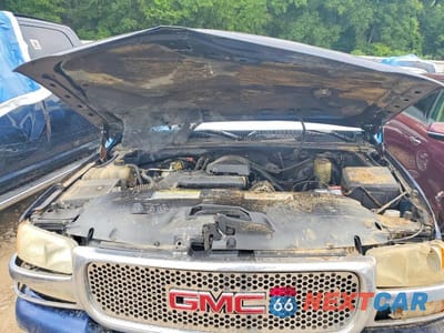 Zdjęcie 11 z 12 samochodu: 1999 GMC NEW SIERRA K1500 VIN:1GTEK19T1XZ519969 - miniatura