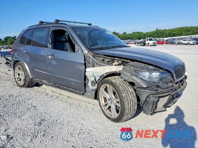 Czwarte zdjęcie samochodu z boku: 2010 BMW X5 M VIN:5YMGY0C5XALK25662 - miniatura