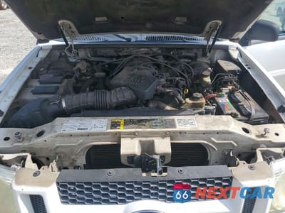 Zdjęcie 11 z 13 samochodu: 2003 FORD EXPLORER SPORT TRAC VIN:1FMDU67E93UC58648 - miniatura