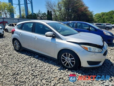 Czwarte zdjęcie samochodu z boku: 2016 FORD FOCUS SE VIN:1FADP3K23GL282954 - miniatura