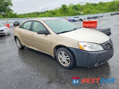 Czwarte zdjęcie samochodu z boku: 2006 PONTIAC G6 SE1 VIN:1G2ZG558164120913 - miniatura