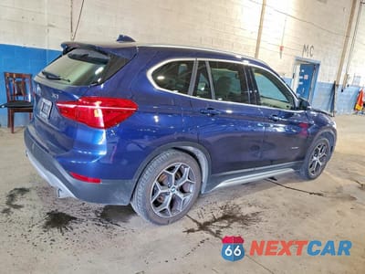 Trzecie zdjęcie samochodu z tyłu: 2018 BMW X1 XDRIVE28I VIN:WBXHT3C3XJ5F92471 - miniatura
