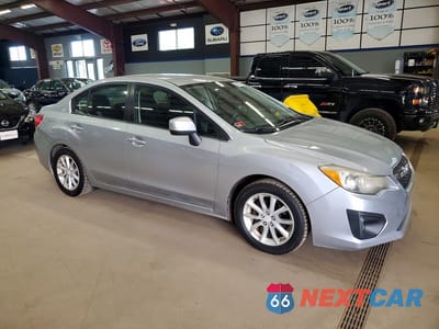 Czwarte zdjęcie samochodu z boku: 2012 SUBARU IMPREZA PREMIUM VIN:JF1GJAB69CH015269 - miniatura