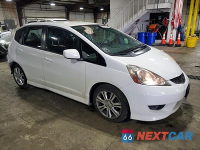 Czwarte zdjęcie samochodu z boku: 2009 HONDA FIT SPORT VIN:JHMGE88679S051776 - miniatura