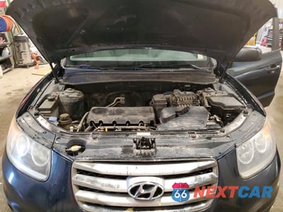 Zdjęcie 12 z 13 samochodu: 2012 HYUNDAI SANTA FE GLS VIN:5XYZGDAB6CG152146 - miniatura
