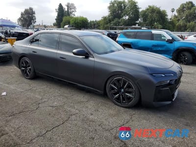 Czwarte zdjęcie samochodu z boku: 2024 BMW 740 I VIN:WBA23EH05RCT09490 - miniatura