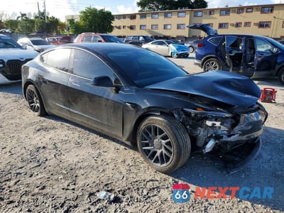 Czwarte zdjęcie samochodu z boku: 2024 TESLA MODEL 3 VIN:5YJ3E1EB1RF736104 - miniatura