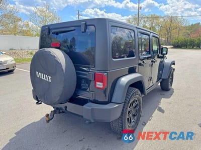 Trzecie zdjęcie samochodu z tyłu: 2015 JEEP WRANGLER UNLIMITED SPORT VIN:1C4BJWDG9FL542754 - miniatura