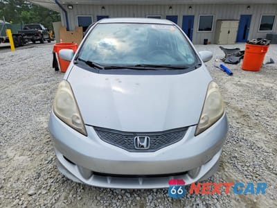 Piąte zdjęcie samochodu w środku: 2011 HONDA FIT SPORT VIN:JHMGE8H52BC002993 - miniatura