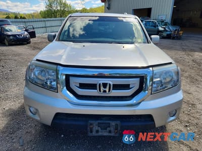 Piąte zdjęcie samochodu w środku: 2011 HONDA PILOT EX VIN:5FNYF4H45BB103094 - miniatura